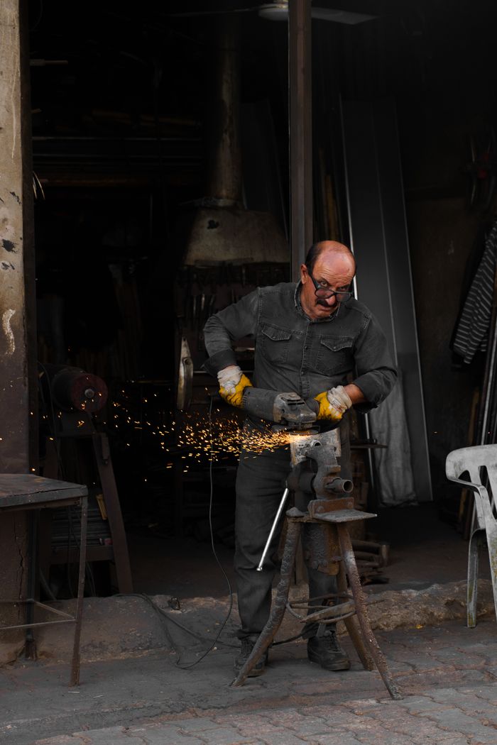 A skilled worker in a workshop