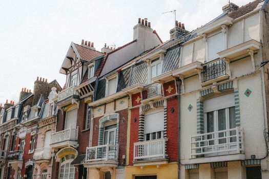 Colorful ornate facades of historic homes in Dunkerque, France, showcasing traditional architecture.