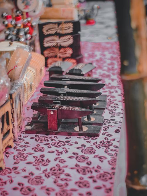 Free Artistic wooden blocks for textile printing in a Rangpur market stall, showcasing traditional craftsmanship. Stock Photo
