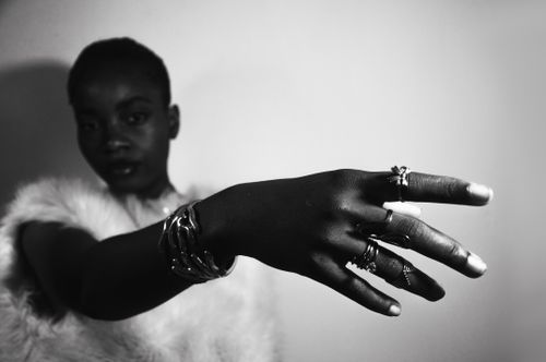 Free Striking black and white portrait highlighting jewelry and fashion style. Stock Photo