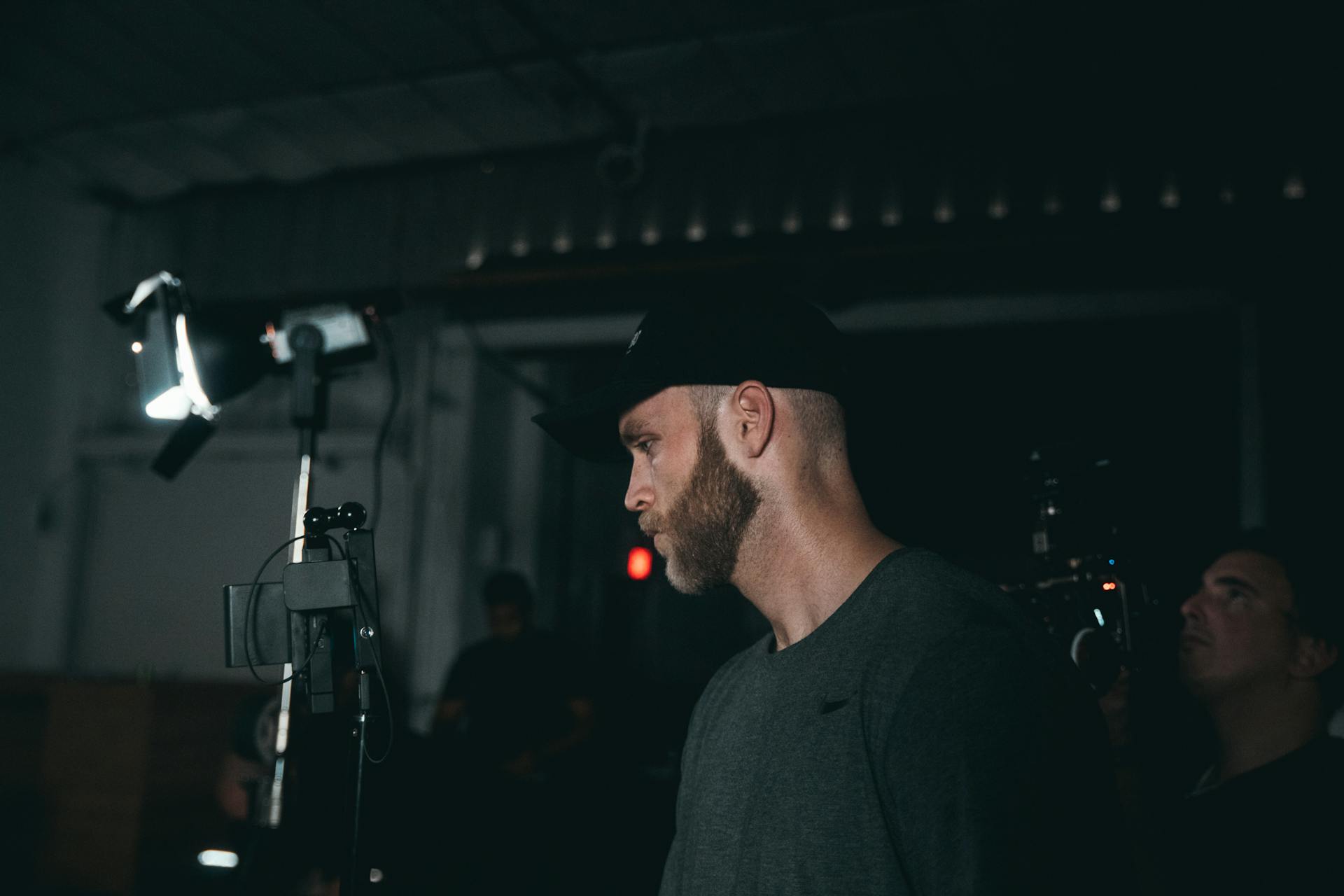 Man Wearing Black Fitted Cap