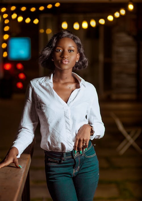 Free Woman Wearing White Long-sleeved Collared Shirt Stock Photo