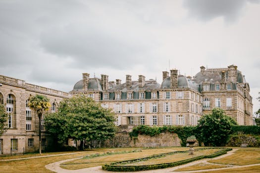 Stunning view of a neoclassical building in Vannes, Bretagne, France, with cloudy skies.