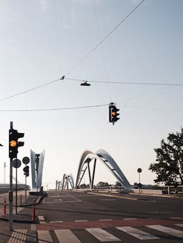 A modern bridge in Linz, Austria, photographed during the day, showcasing contemporary architecture and urban design.