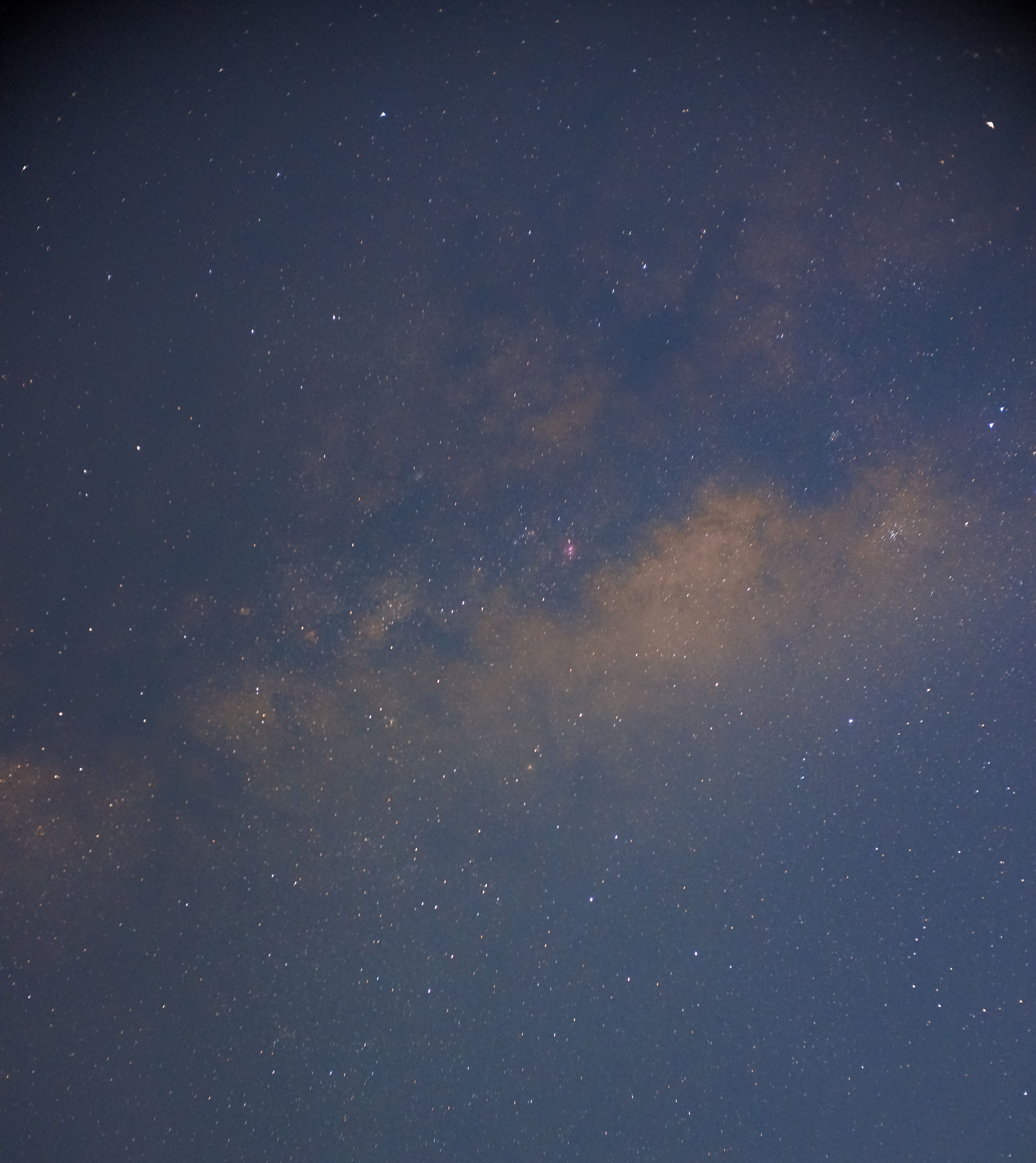 A breathtaking view of the Milky Way galaxy illuminating the night sky.