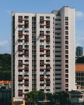 A modern high-rise apartment building in Singapore showcasing urban architecture.