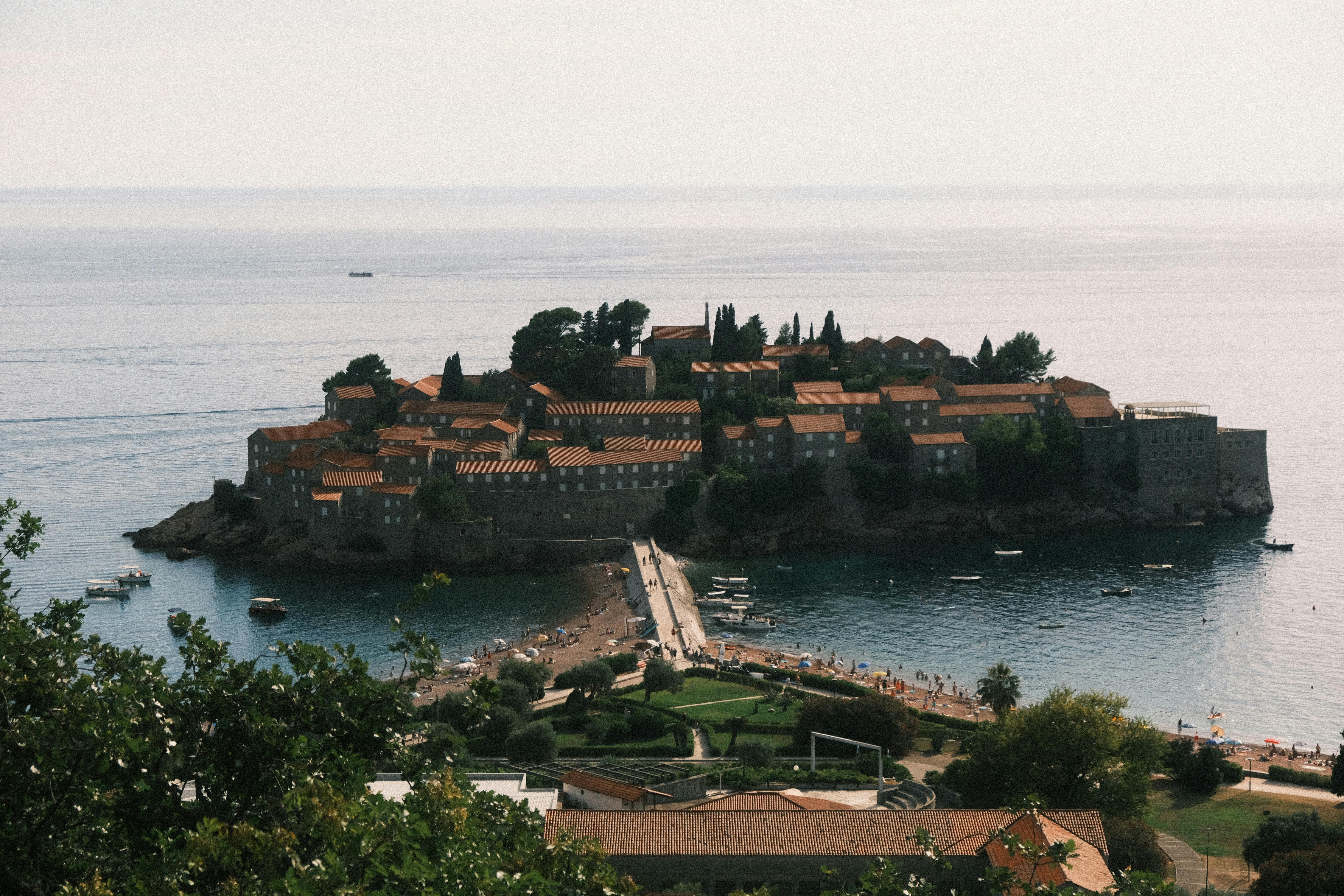 Scenic aerial view of Sveti Stefan, a picturesque island and resort in Montenegro.