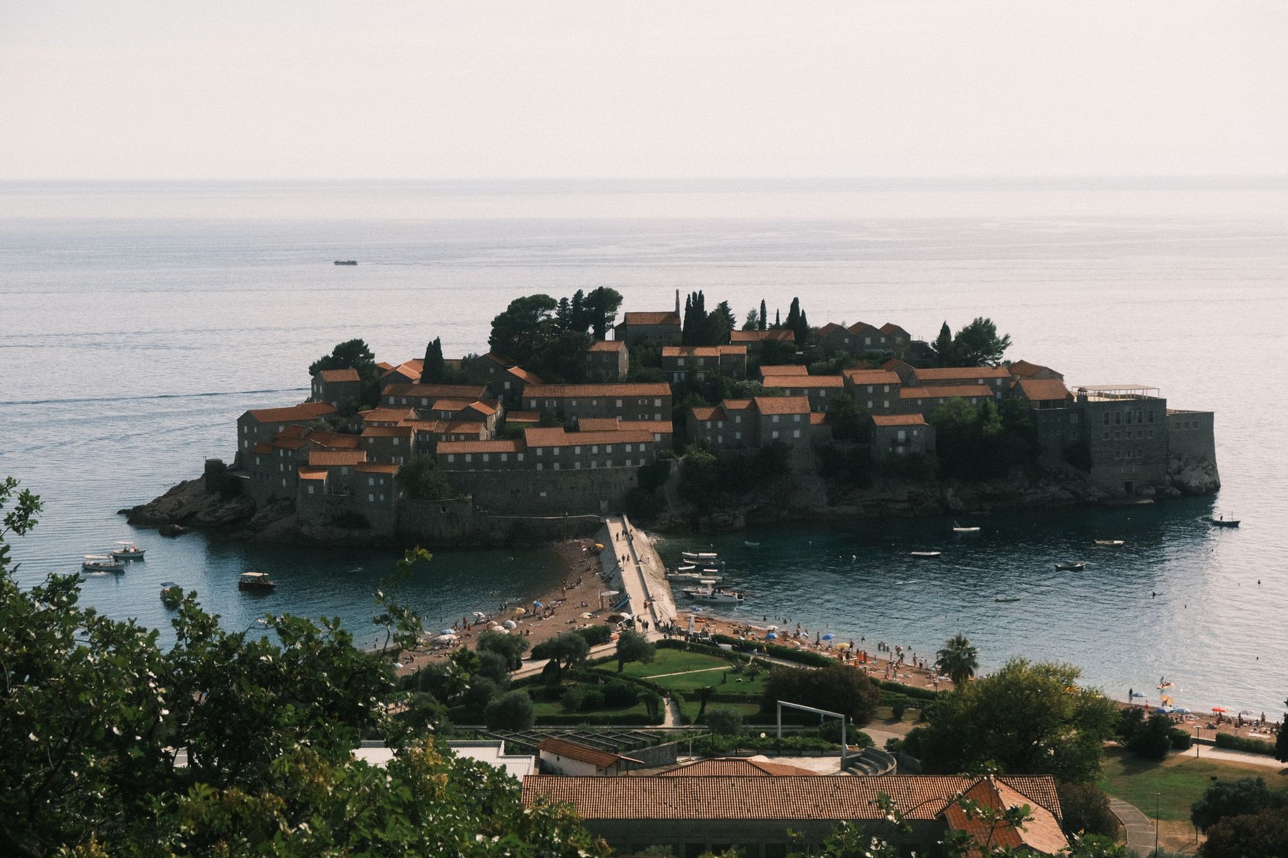 Scenic aerial view of Sveti Stefan, a picturesque island and resort in Montenegro.