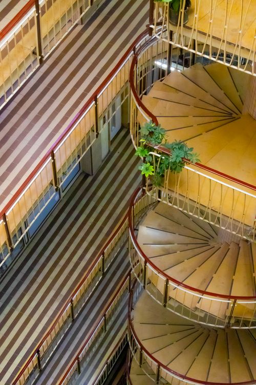 Free Aerial view of elegant spiral stairs and patterned floors in an Istanbul building. Stock Photo