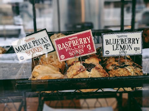 Raspberry Filled Scones at 3 Dollar, Blueberry Lemon Scones at 2.65 Dollar, and Maple Pecan Scones at 2.75 Dollar