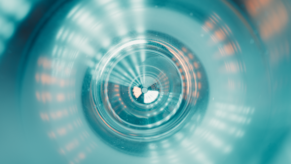 Abstract image showcasing a tunnel-like view with colorful futuristic lighting patterns. Abstract image showcasing a tunnel-like view with colorful futuristic lighting patterns.