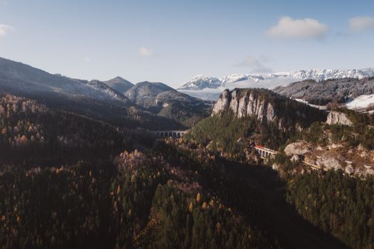 Stunning autumn landscape of Semmering Viaduct with mountains in Lower Austria.