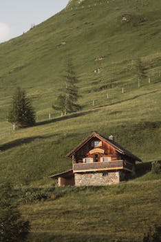Cozy Wooden Cabin on Rolling Hillside