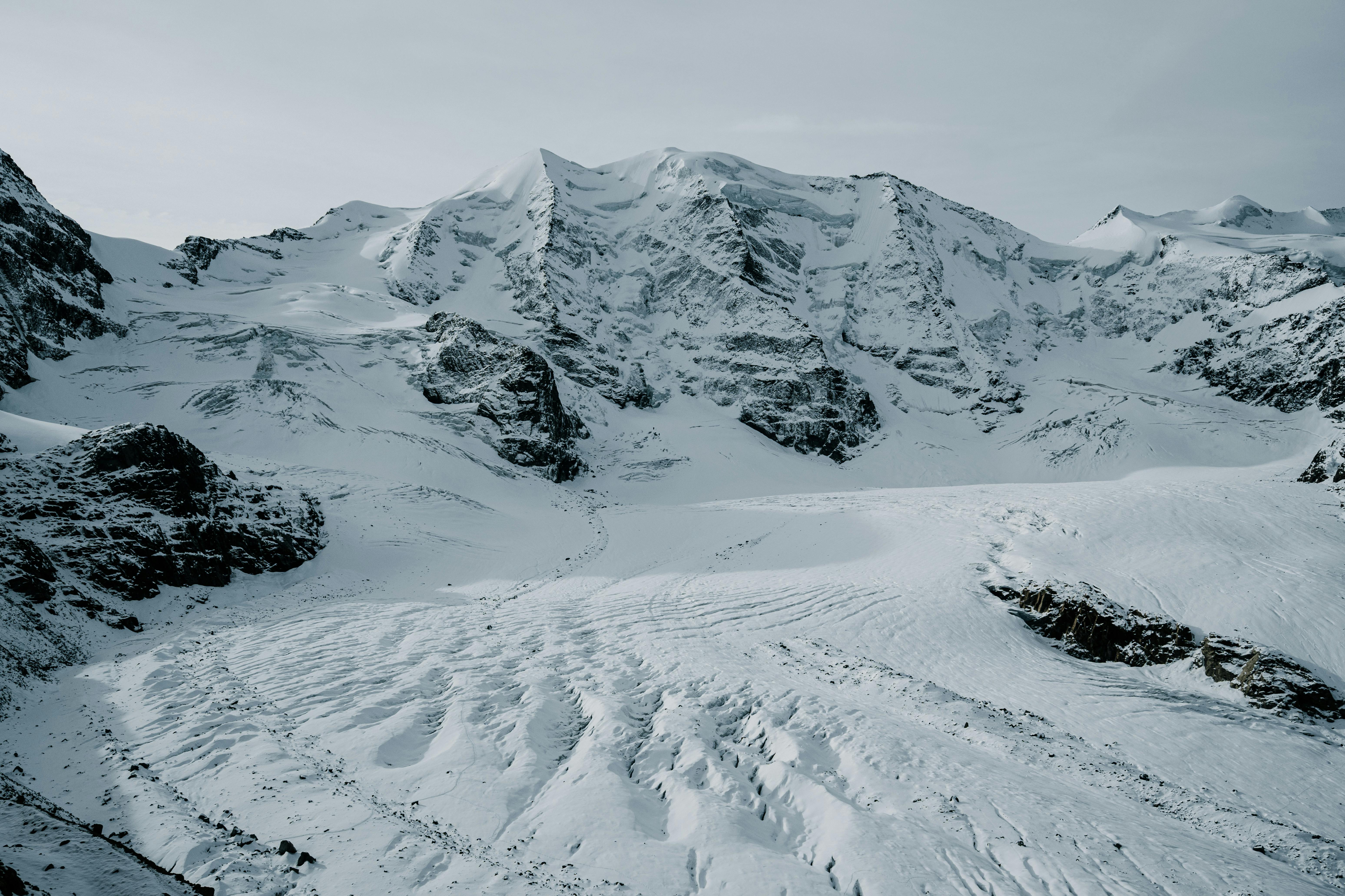 Stunning snowy mountain landscape in Graubünden, Switzerland during winter.