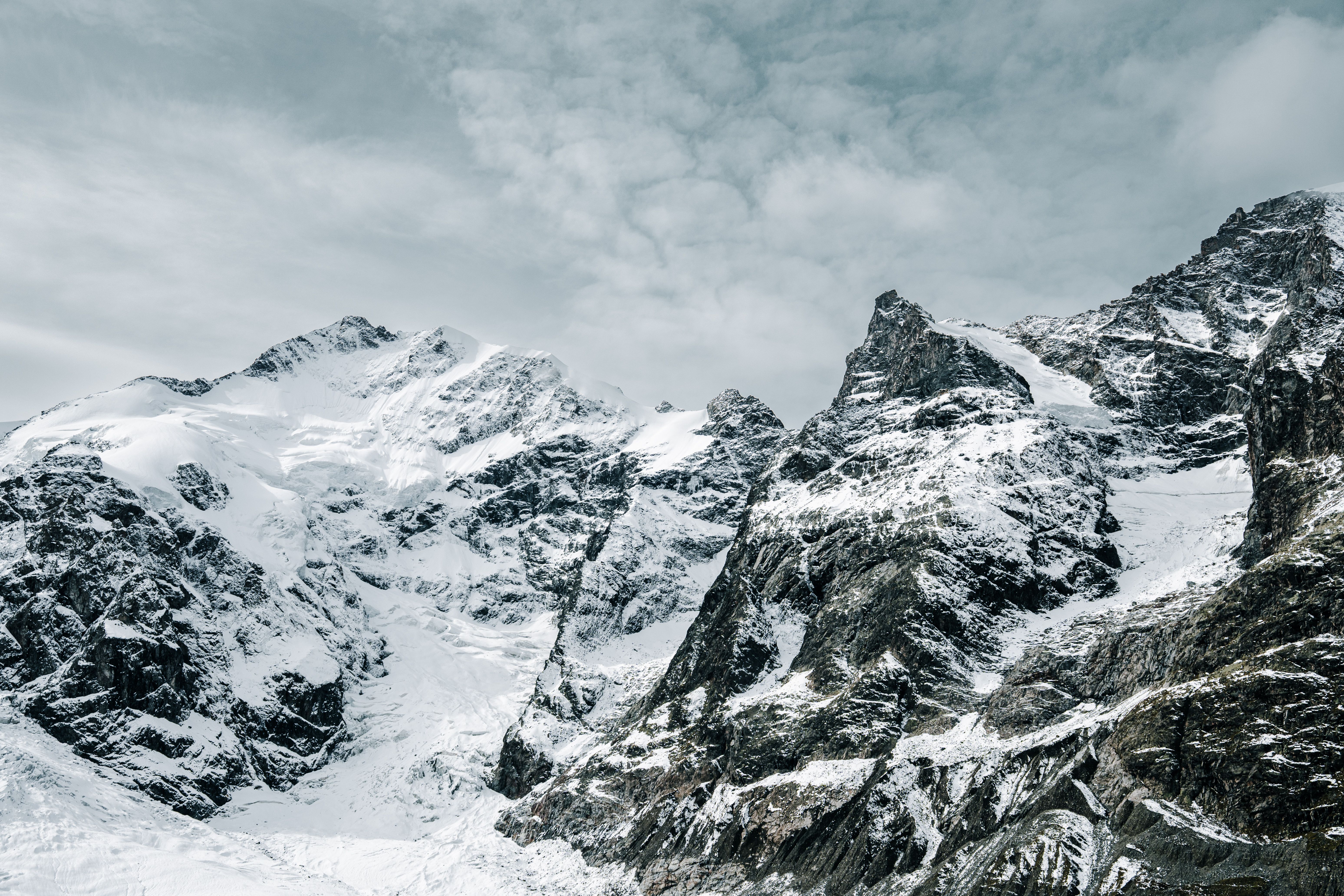 Majestic Snow-Covered Swiss Alps in Winter · Free Stock Photo