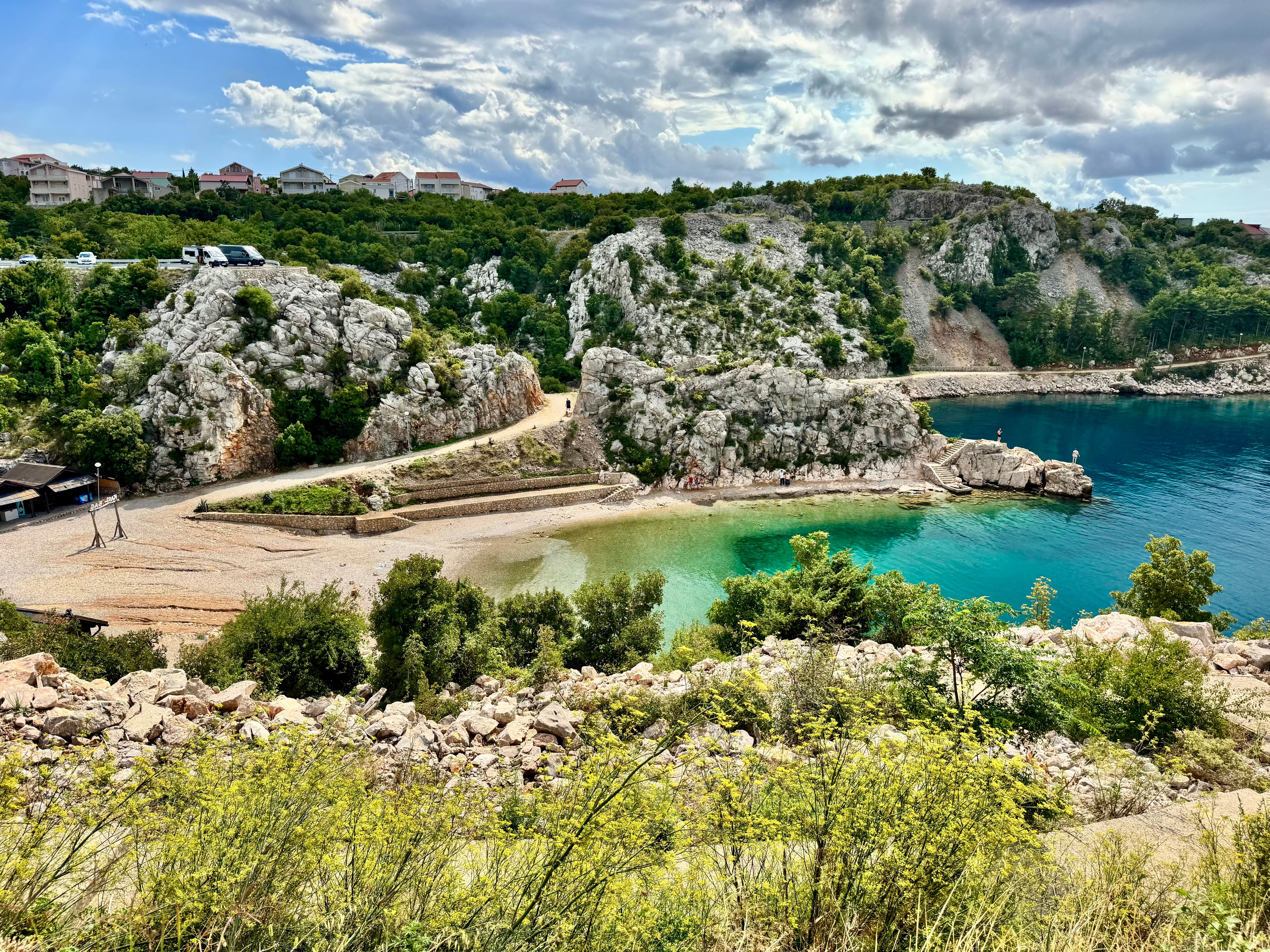 Beautiful coastal landscape with cliffs and turquoise water in Karlobag, Croatia.