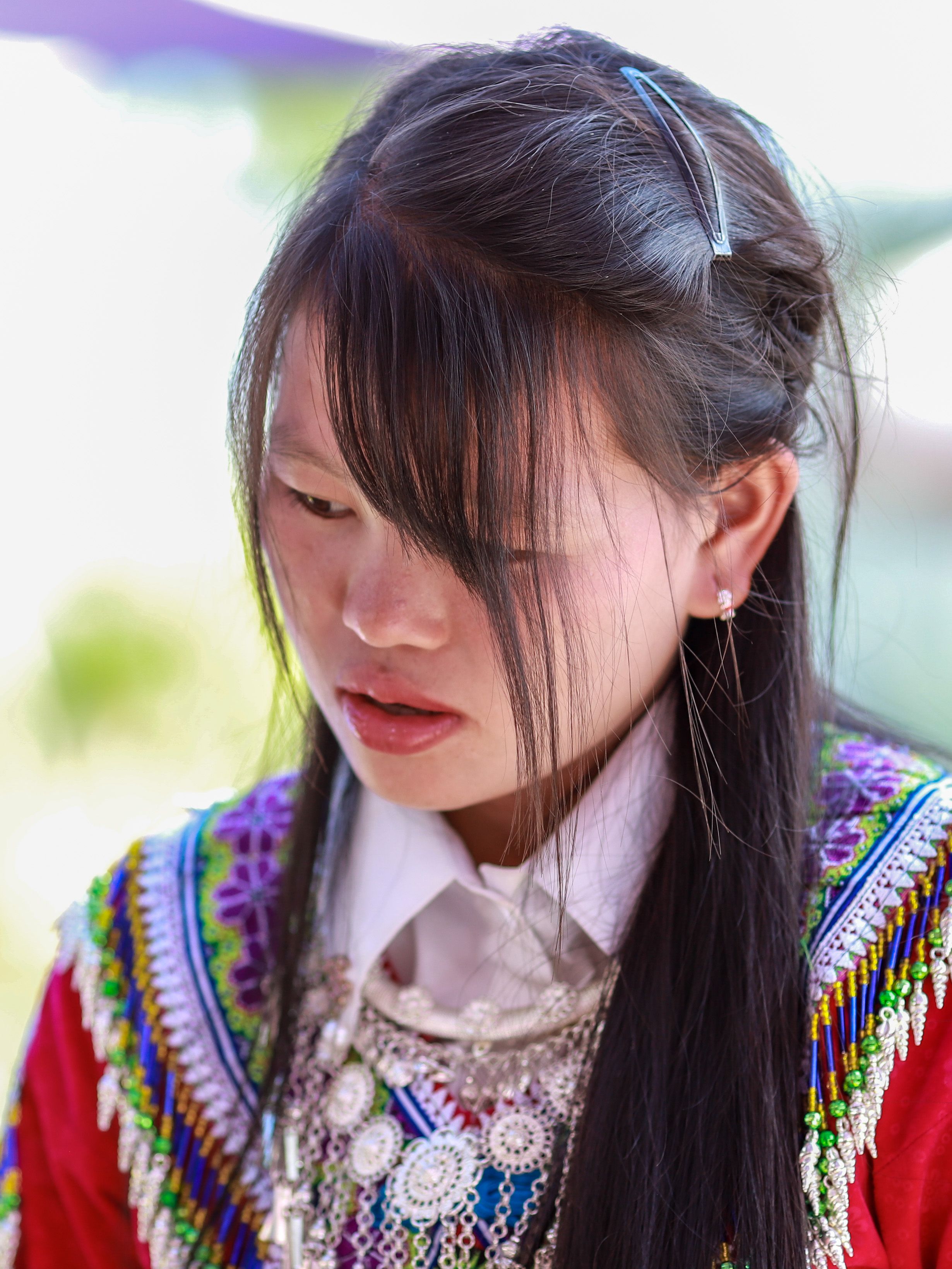 Portrait of a Hmong Woman in Traditional Attire · Free Stock Photo