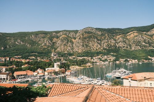 Free A panoramic view of the Bay of Kotor with yachts and surrounding mountains in Montenegro. Stock Photo