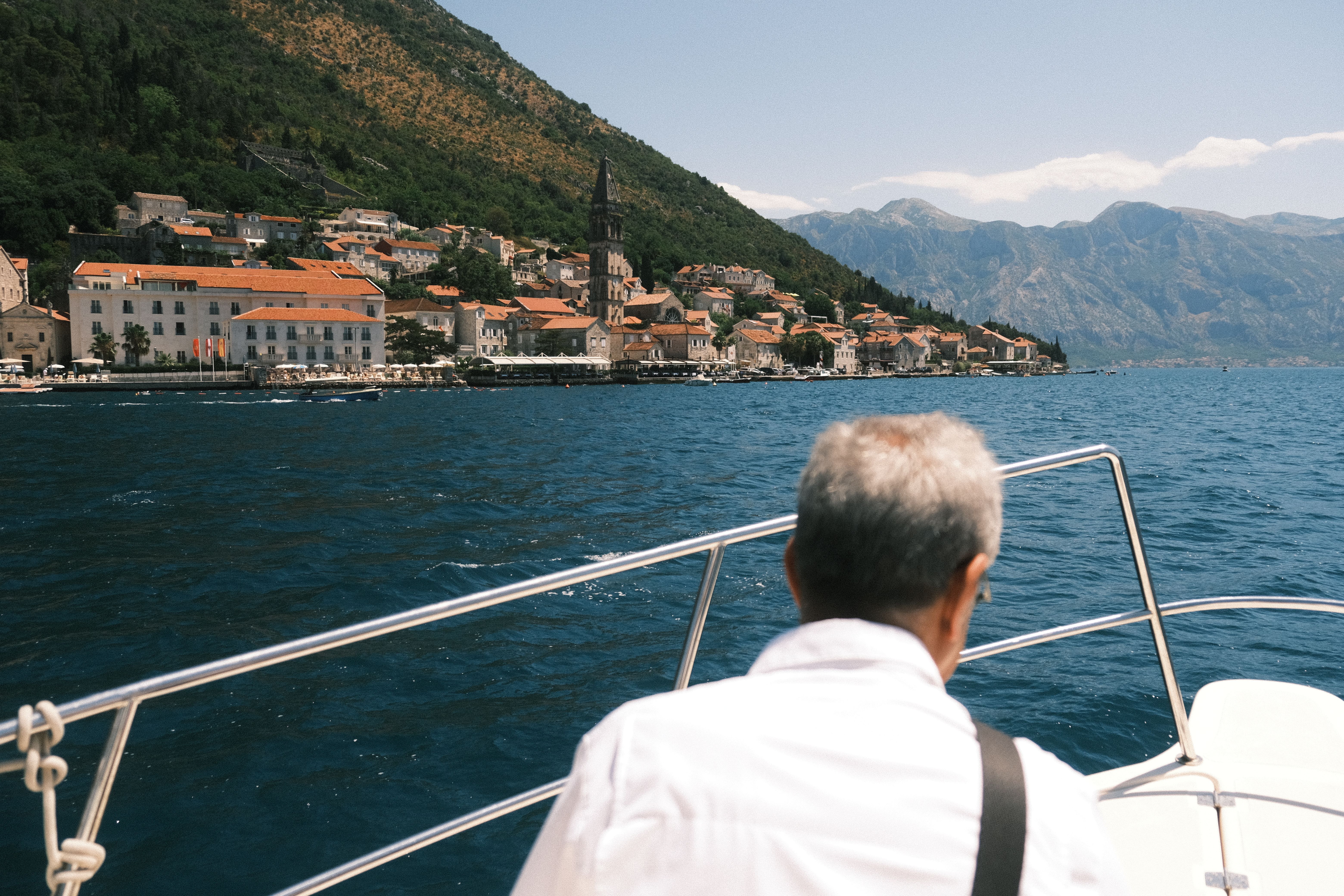 Explore the stunning coastal town of Perast from a boat in Montenegro's Bay of Kotor Explore the stunning coastal town of Perast from a boat in Montenegro's Bay of Kotor