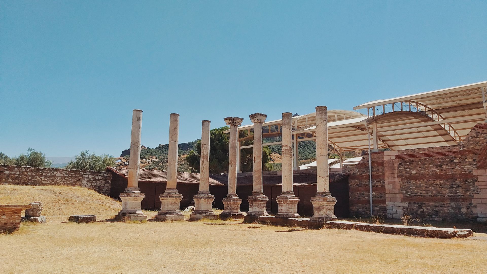 Historic stone columns at archaeological site in Manisa, Türkiye.