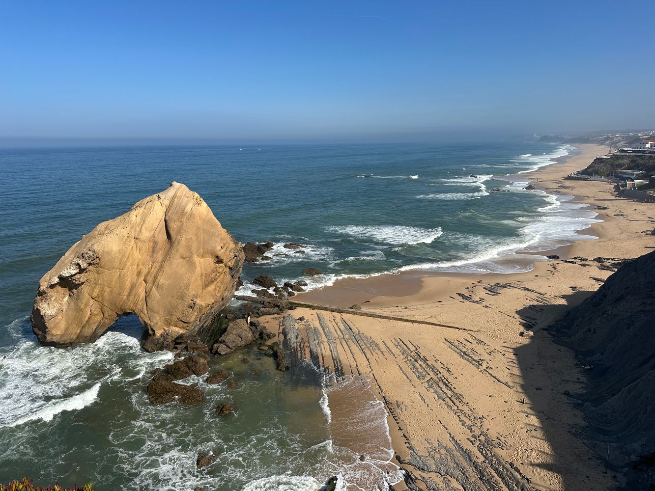 Sand crescent of Praia do Rosa seen from the Miradouro da Vigia