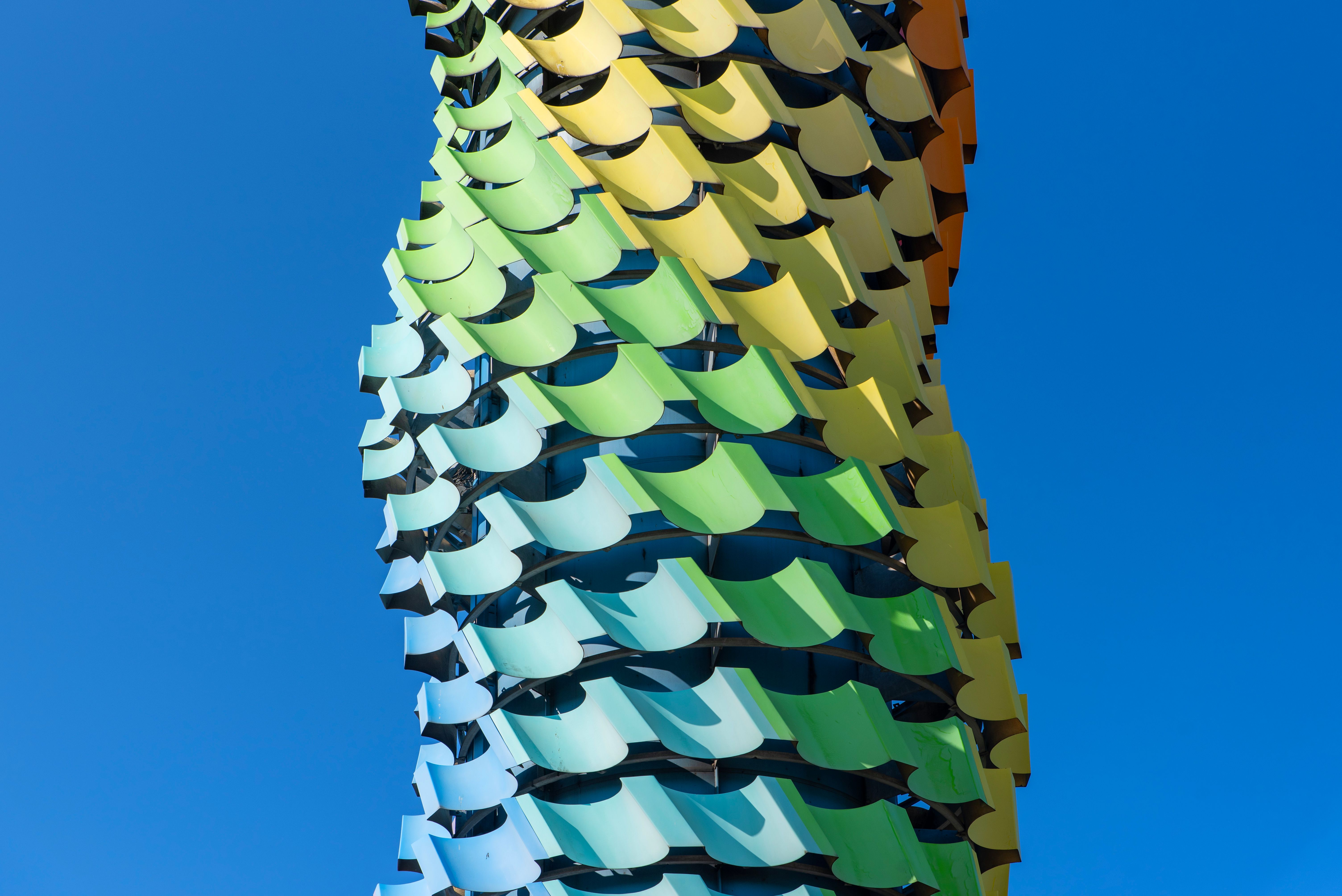Colorful Architectural Structure Against Blue Sky · Free Stock Photo