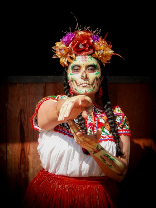 Free Portrait of a woman in traditional Día de los Muertos attire and makeup, celebrating in Mexico City. Stock Photo