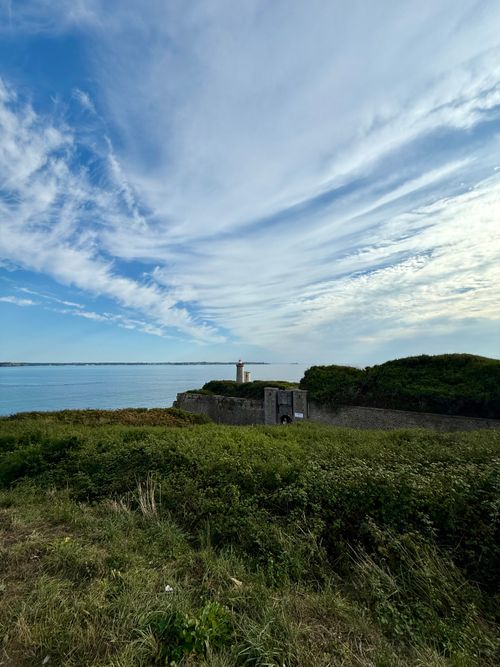 Free Beautiful view of Portzic Lighthouse overlooking the sea and sky in Brittany, France. Stock Photo