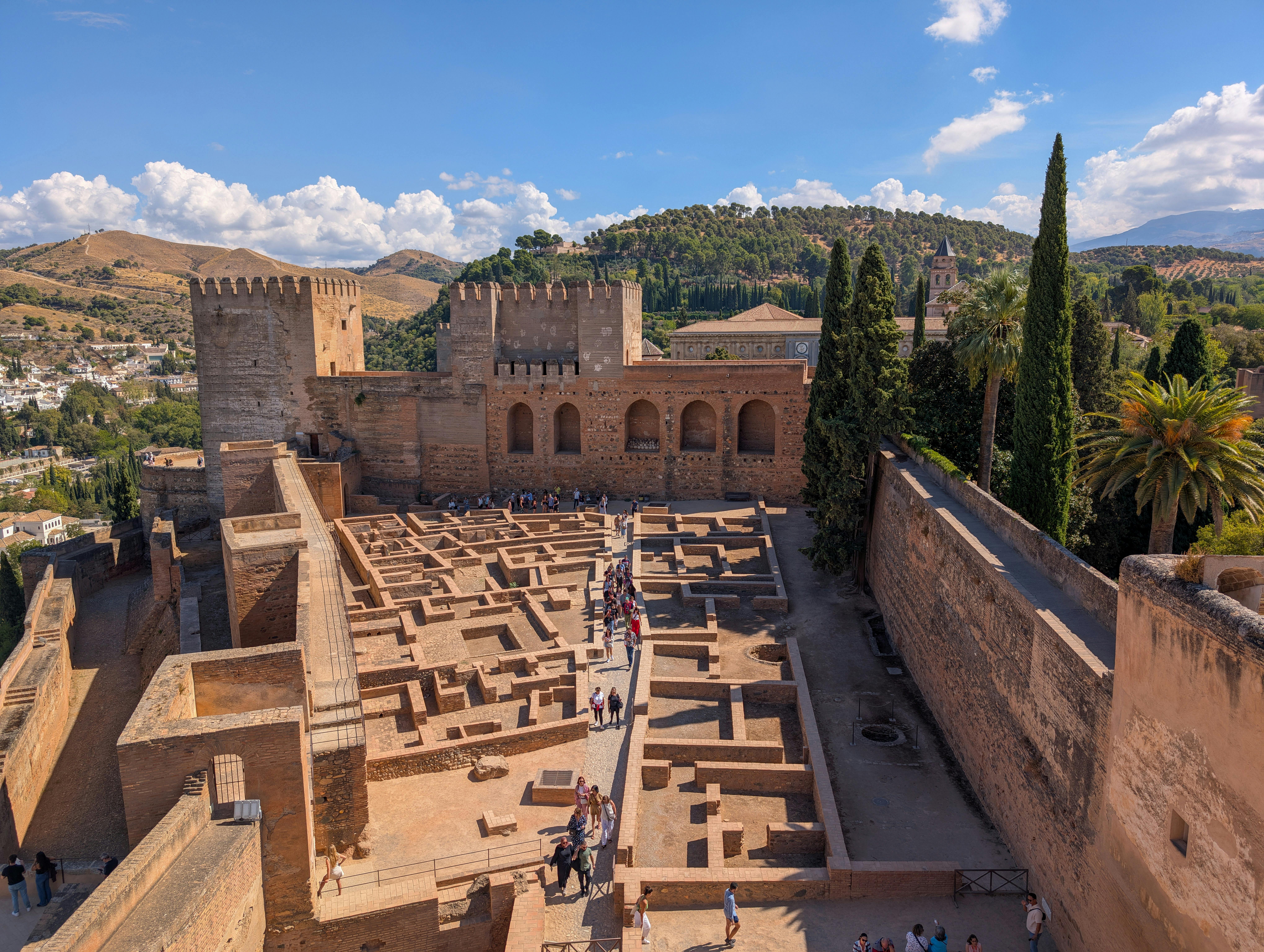 Aerial view of the Alhambra Fortress, showcasing Islamic architecture and cultural heritage in Granada, Spain.