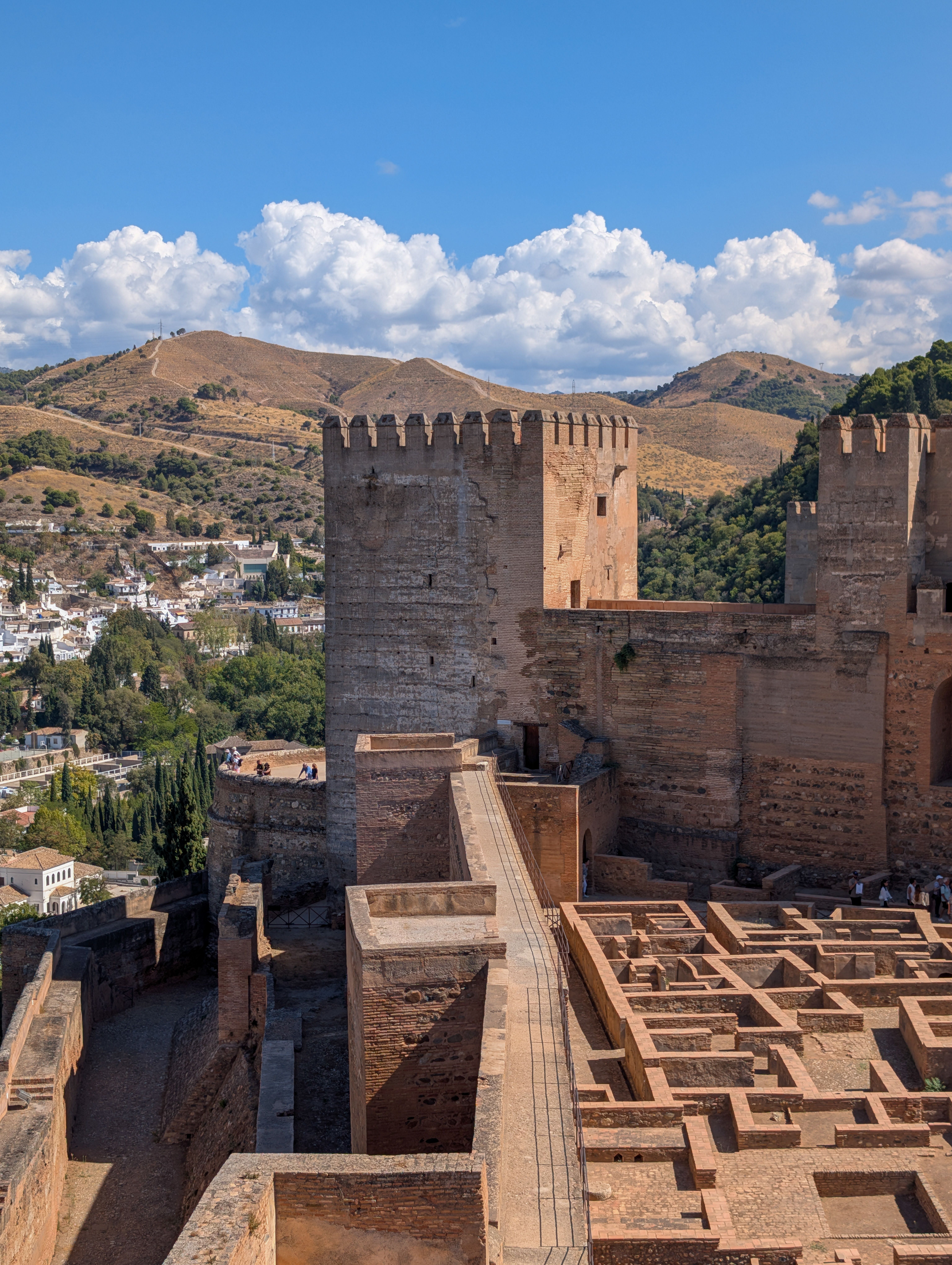 Explore the medieval Alhambra fortress with panoramic views of Andalusia's historical architecture.