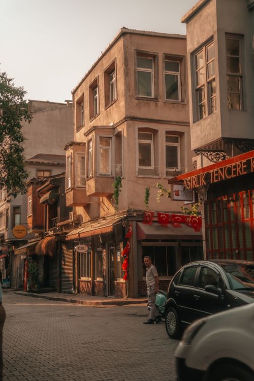 Free A picturesque street scene in Istanbul featuring historic buildings and a vintage atmosphere. Stock Photo