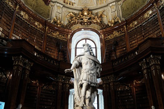 Stunning view of a grand statue in the Austrian National Library's baroque hall.