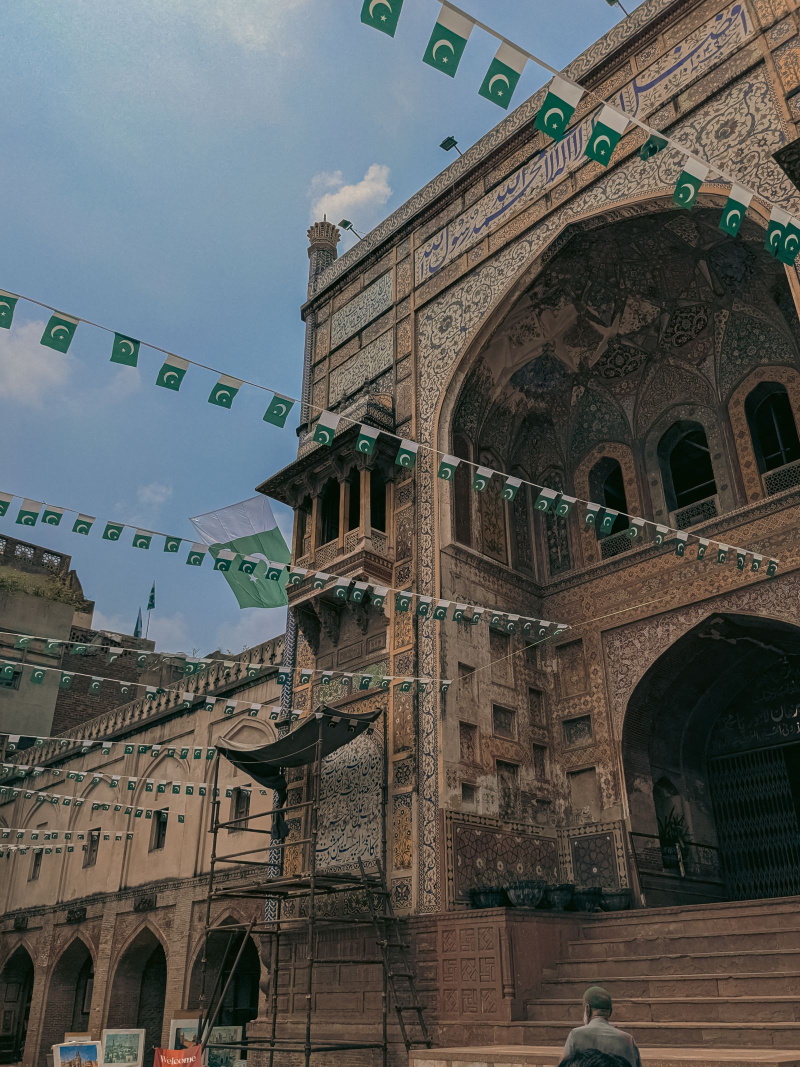 Wazir Khan Mosque decorated with green Independence Day flags, Lahore