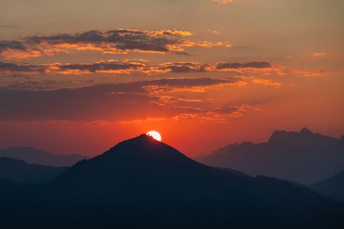 Free Breathtaking sunrise over the Wildschönau mountains, capturing serene beauty in Tirol, Austria. Stock Photo