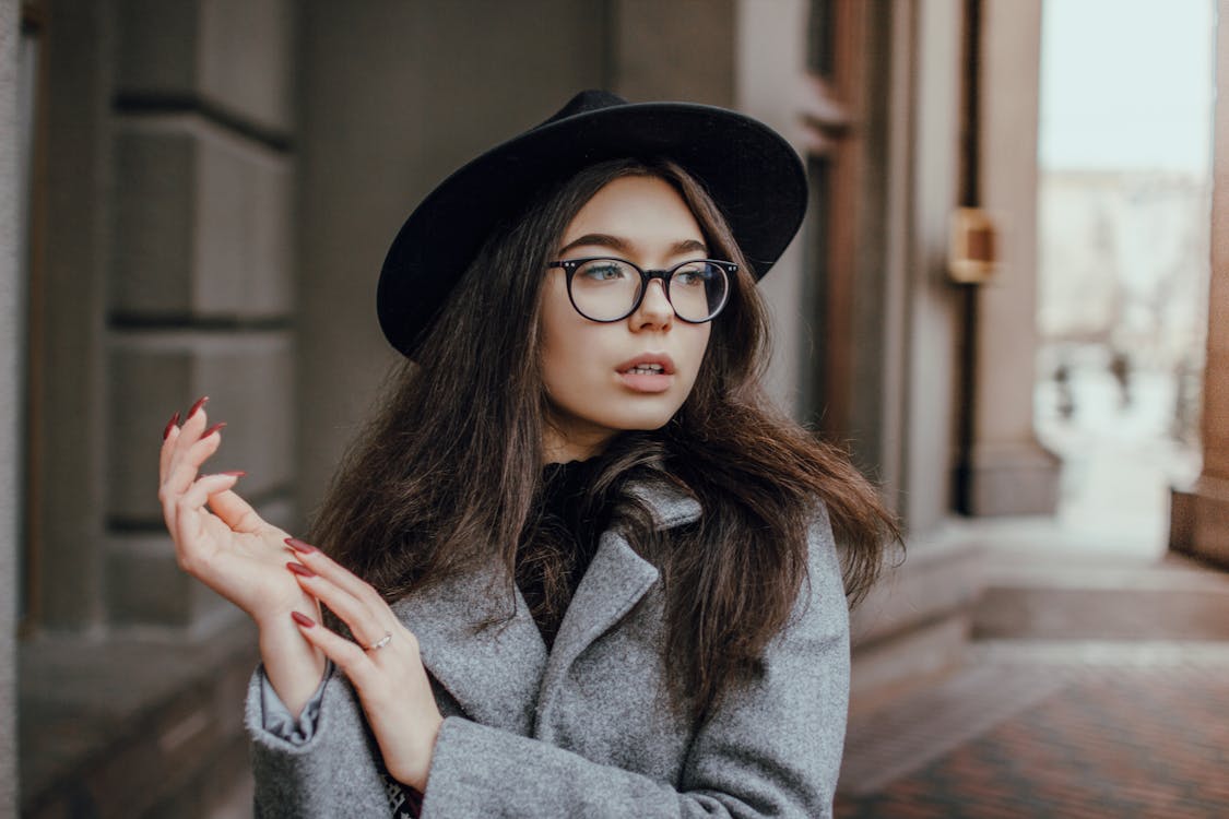Free Woman Wearing Grey Coat and Black Hat Stock Photo