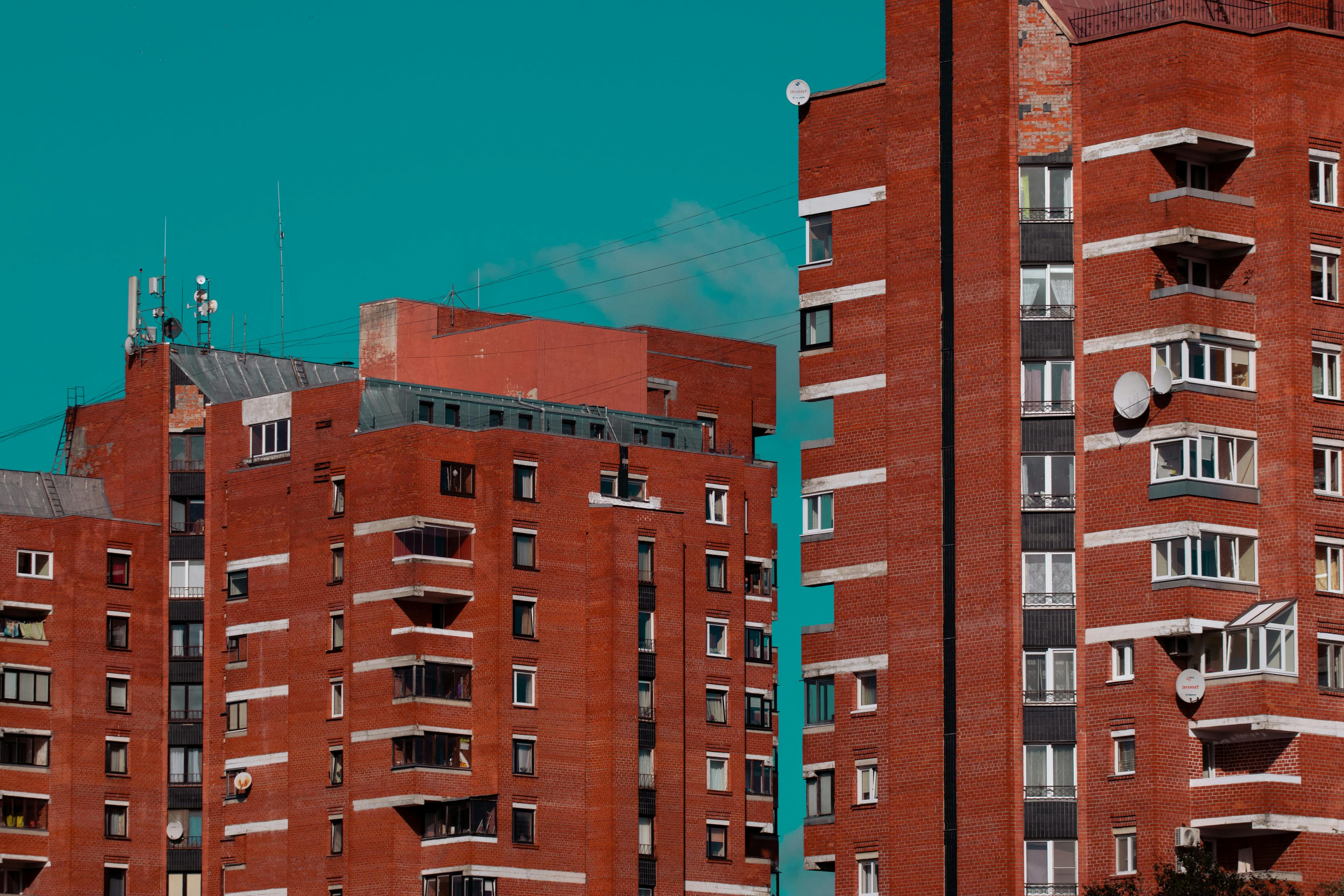 Vibrant Red Brick Buildings in Pārdaugava, Riga · Free Stock Photo