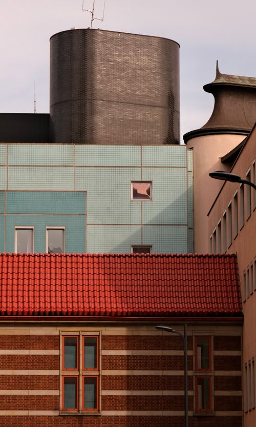 Free A vibrant cityscape featuring colorful building facades and unique structures. Stock Photo