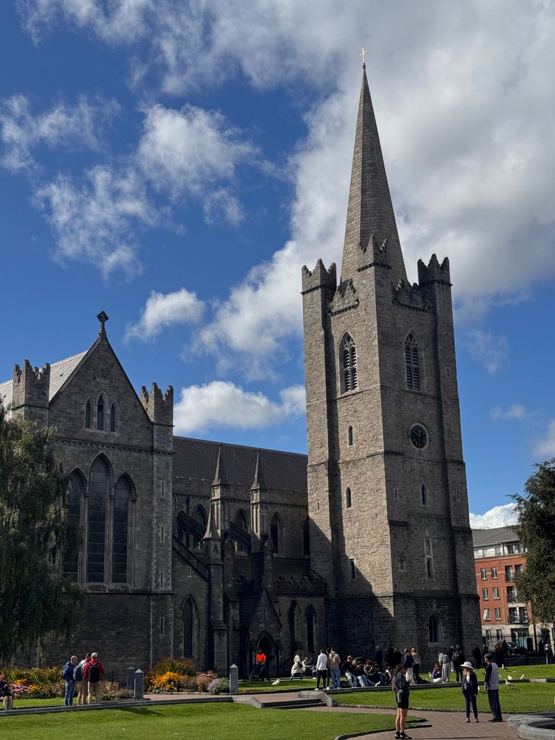 St Patrick's Cathedral tower under a blue sky in Dublin