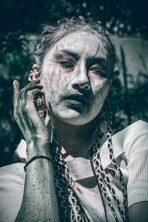 Free A striking portrait featuring dramatic artistic makeup and surreal expression captured in Mexico City. Stock Photo