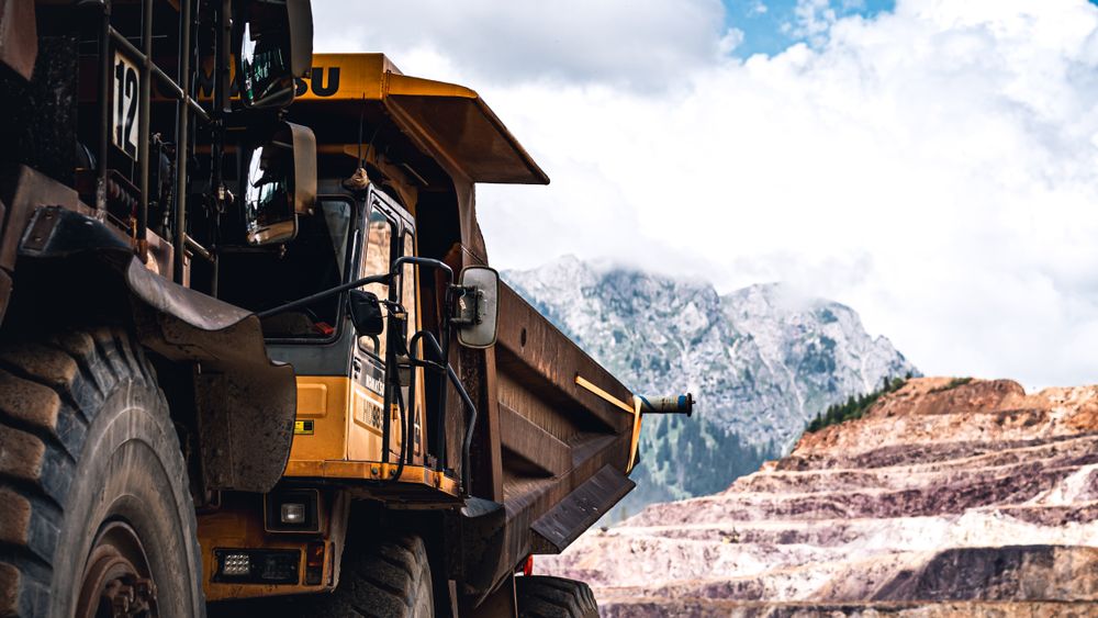 Large mining truck in a mountainous landscape
