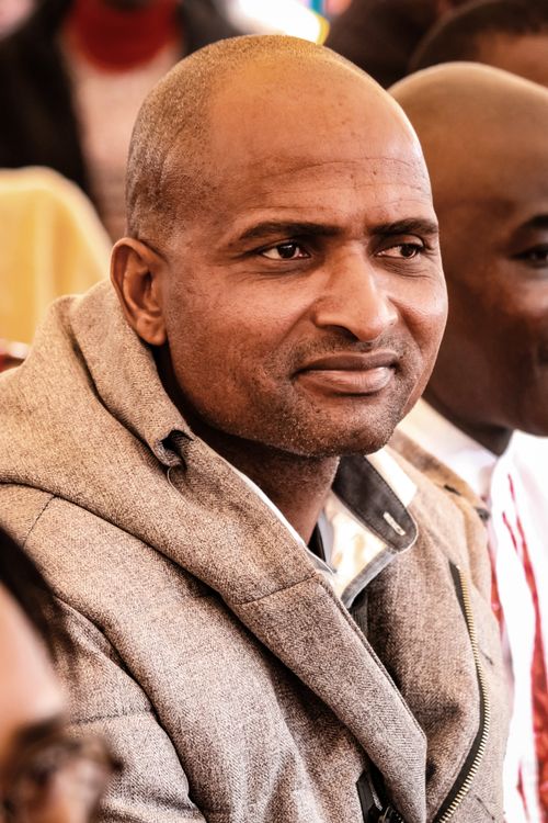 Free Candid portrait of a man attending an event in Siteki, Eswatini. Stock Photo