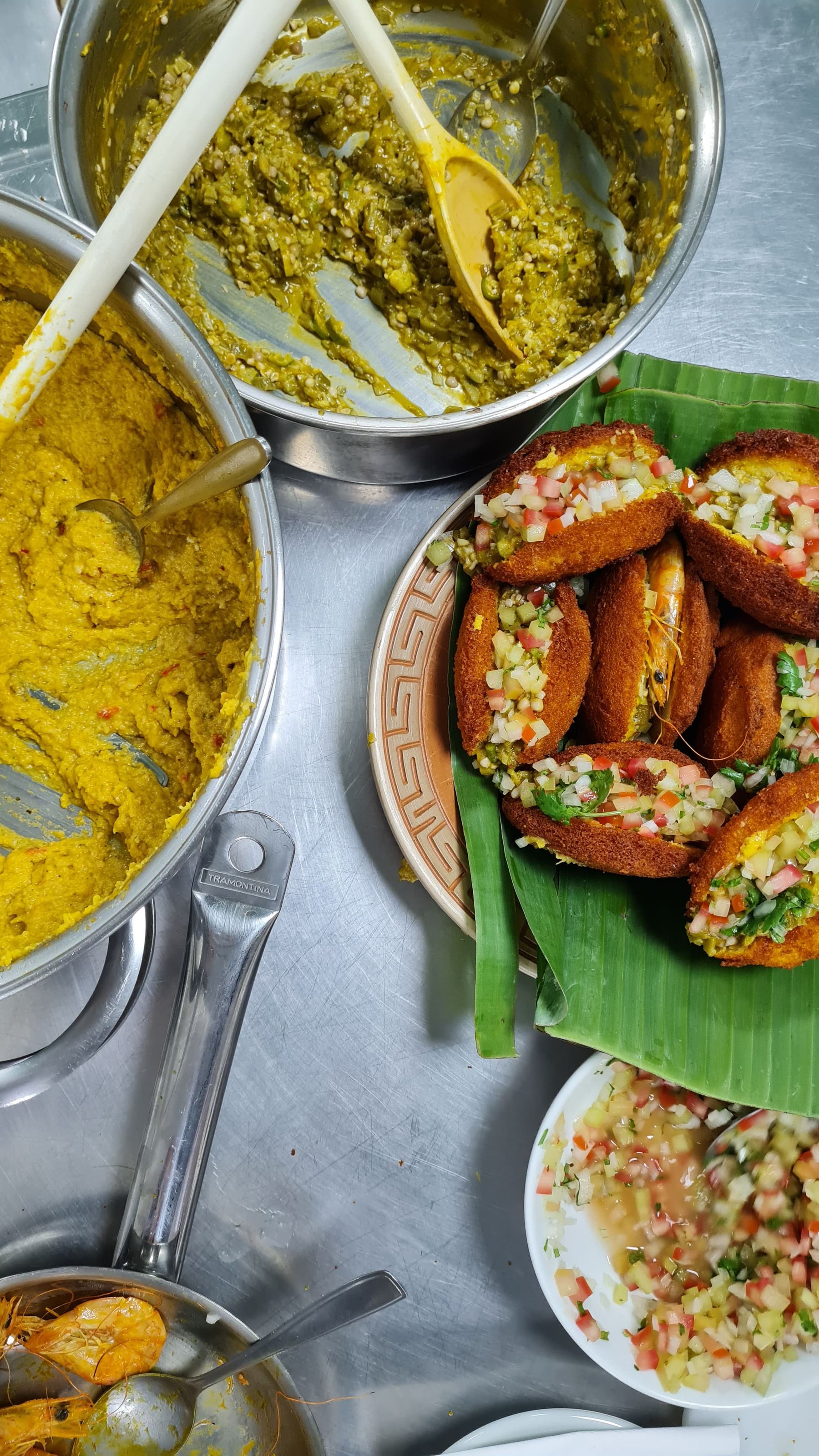 Traditional Brazilian acarajé with colorful fillings