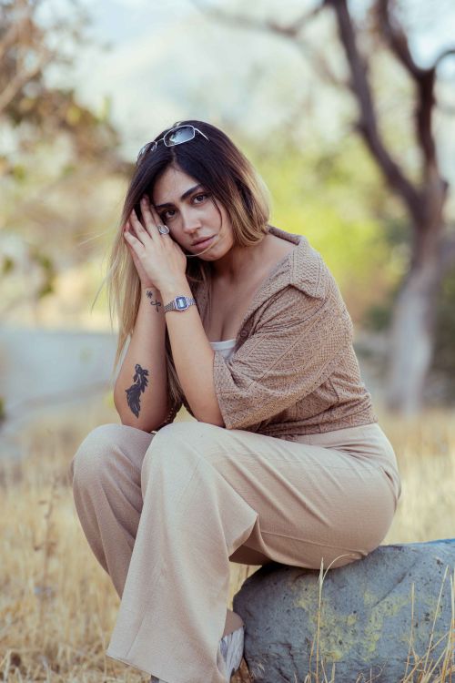 Free Portrait of a young woman posing in a natural setting in Tehran, Iran. Stock Photo