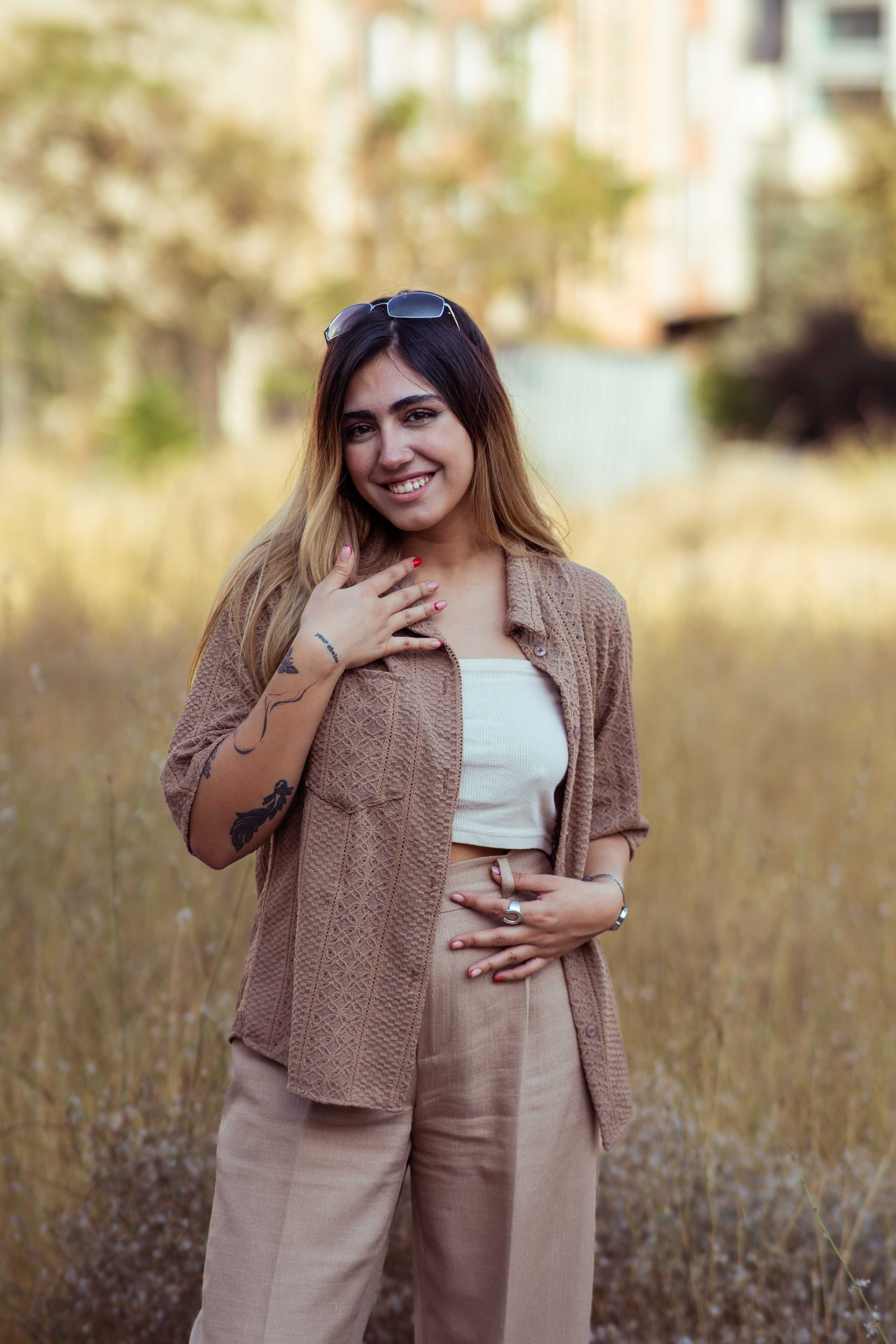 Portrait of a Smiling Woman Outdoors in Tehran · Free Stock Photo