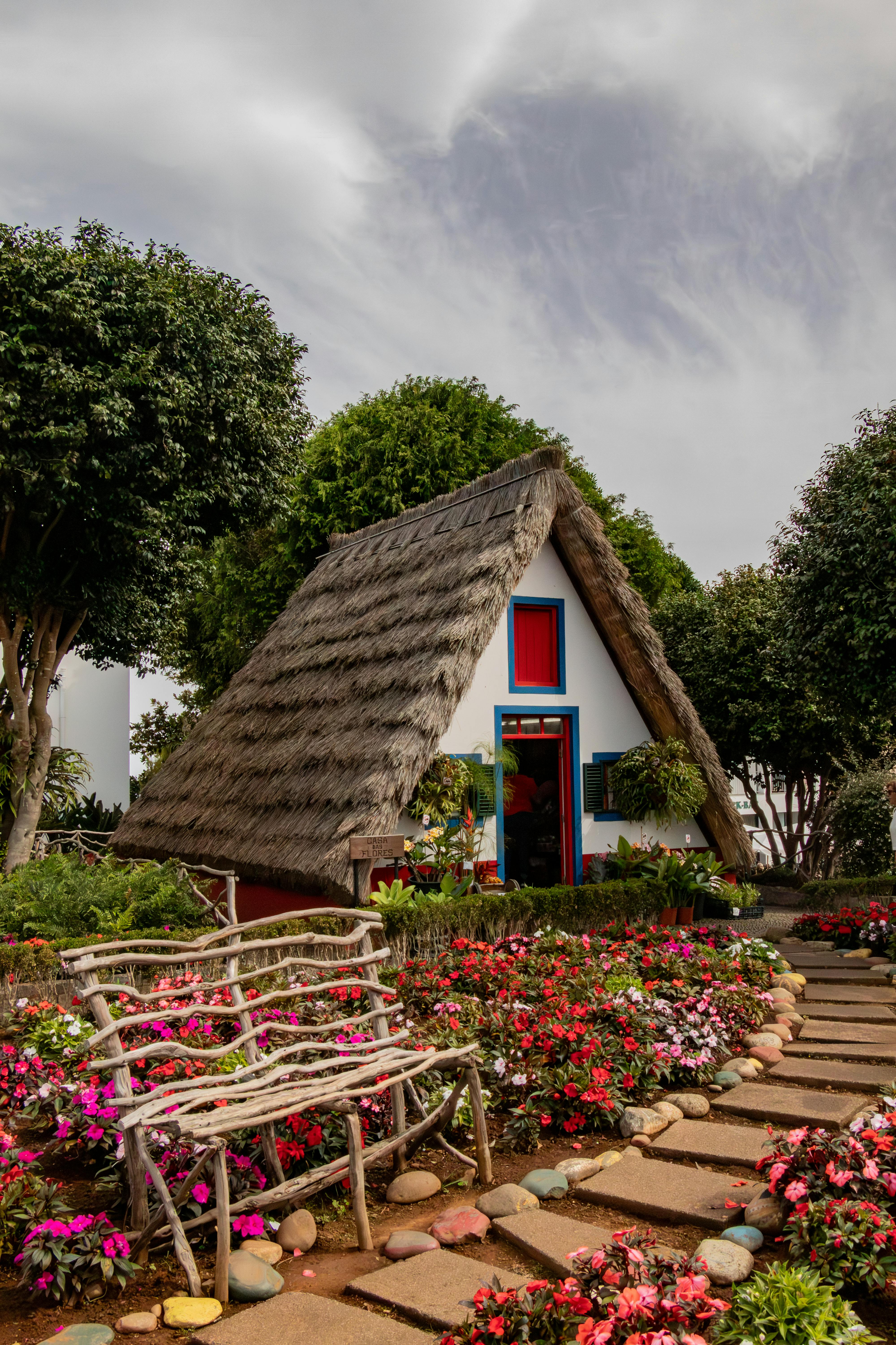 Traditional Santana cottage with colorful flower garden