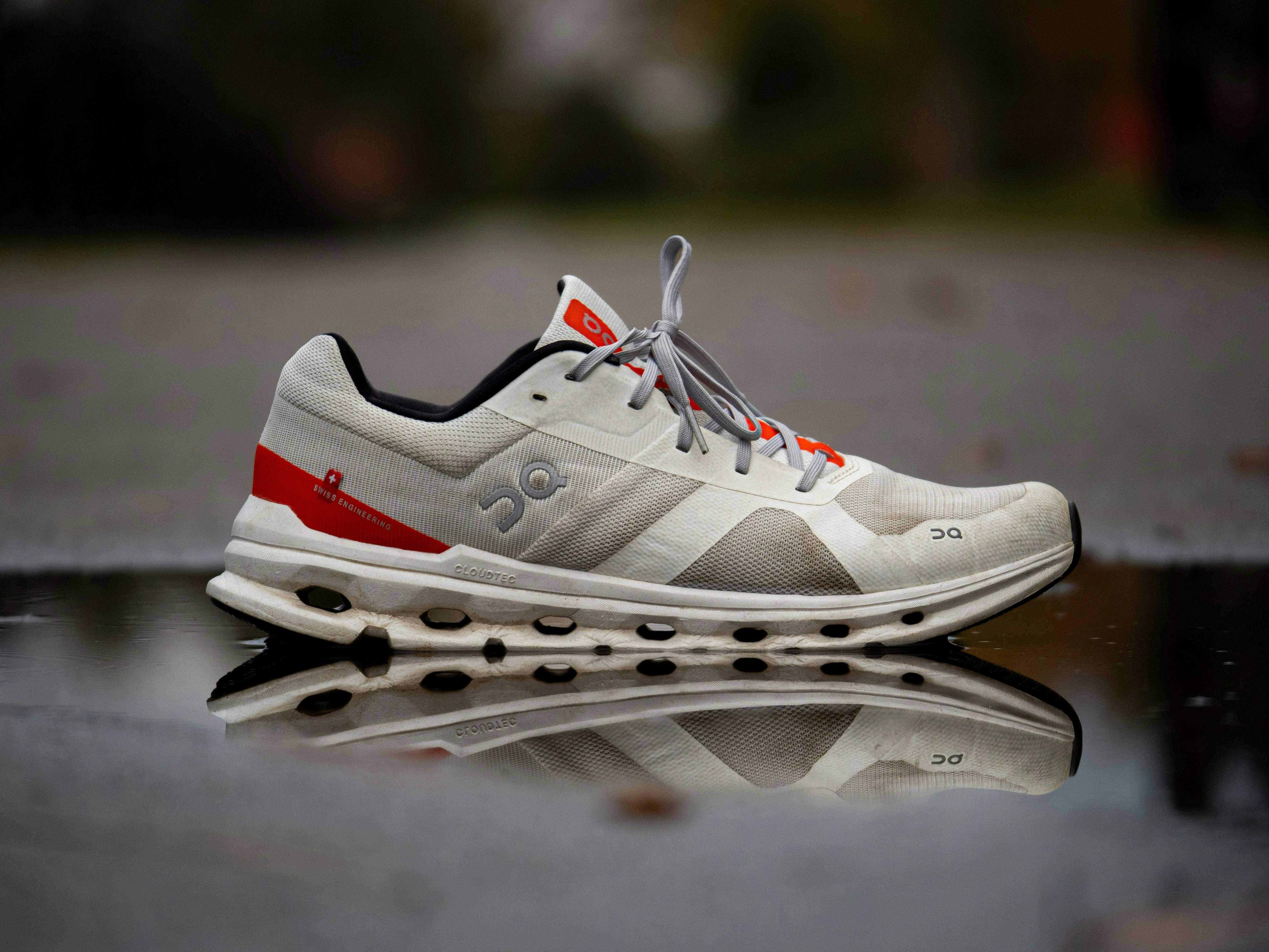 two shoes side by side: minimalist vs maximalist stack height