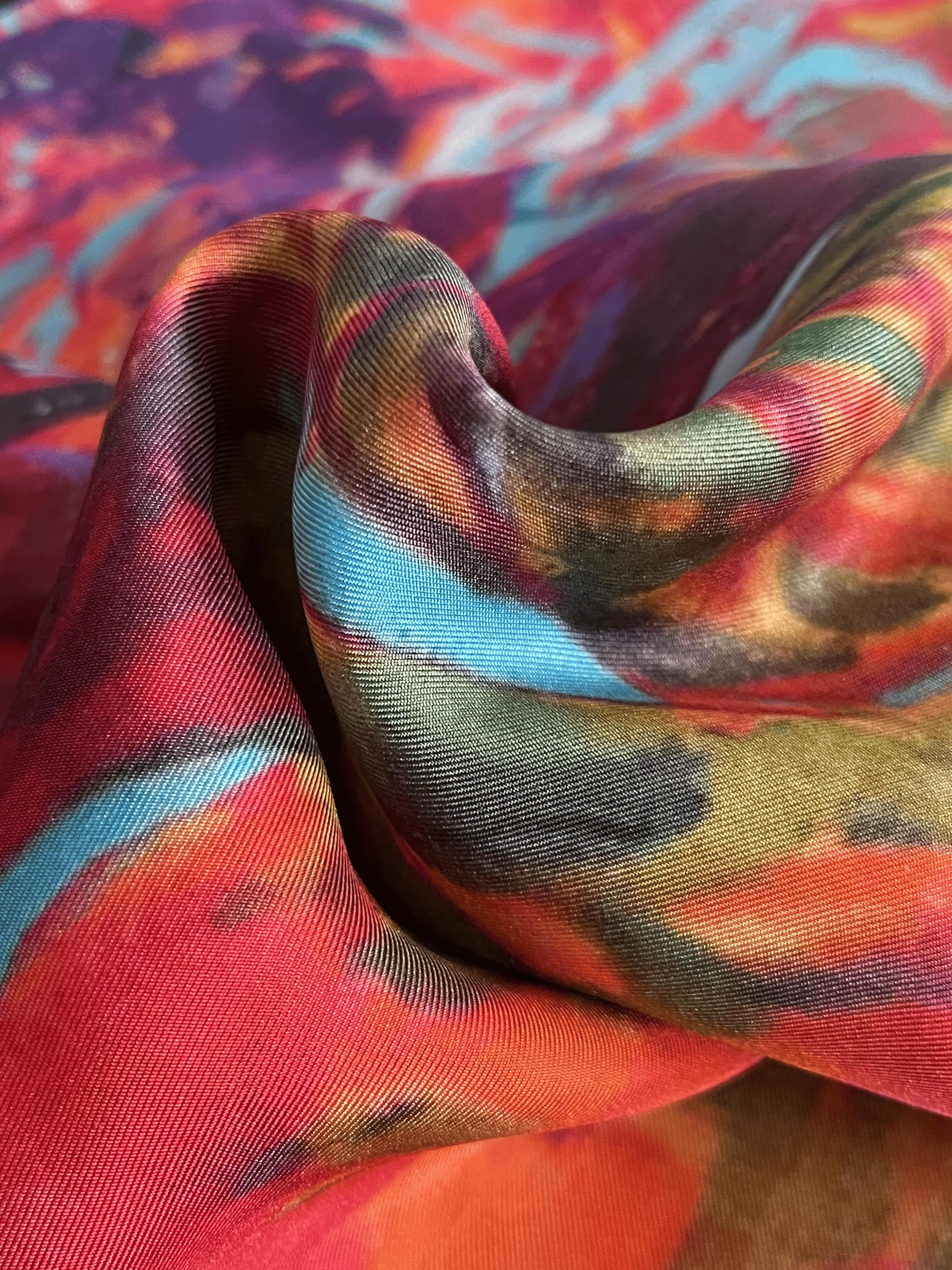 Kostenlos Nahaufnahme eines farbenfrohen Stoffes mit abstraktem Muster, reichhaltigen Texturen und leuchtenden Farben. Stock-Foto