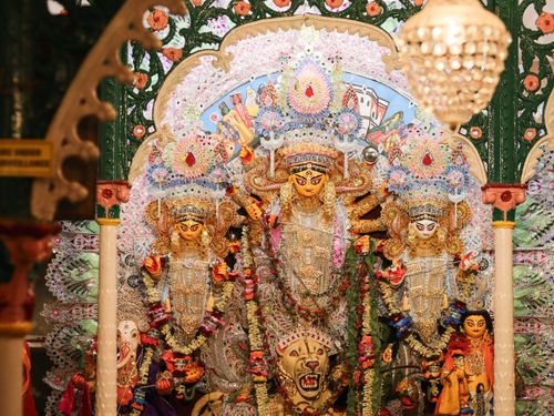 Free A detailed view of a Durga Puja sculpture showcasing ornate decorations and vibrant colors. Stock Photo