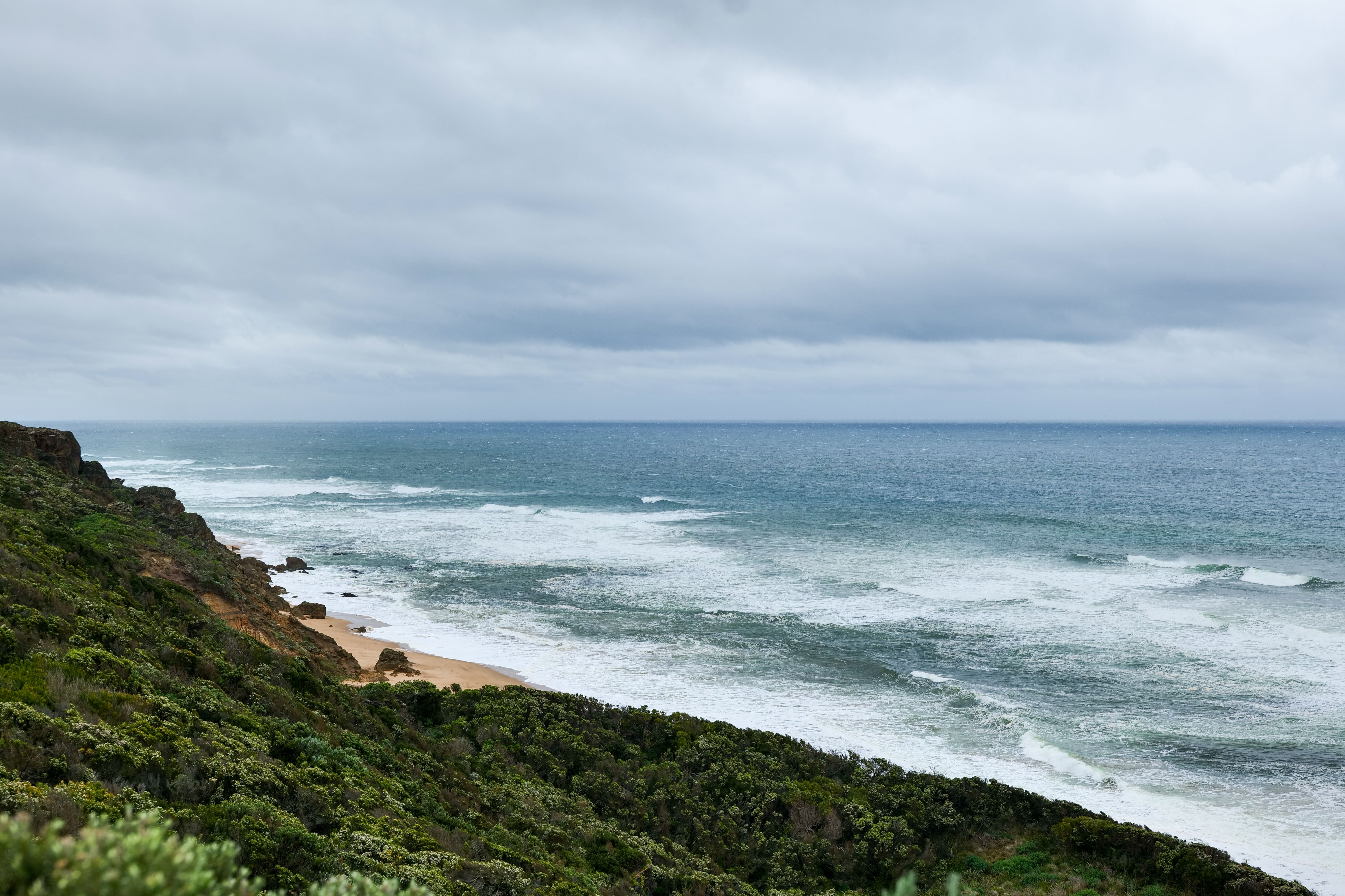 Explore the breathtaking coastline along Australia's Great Ocean Road with expansive ocean views.