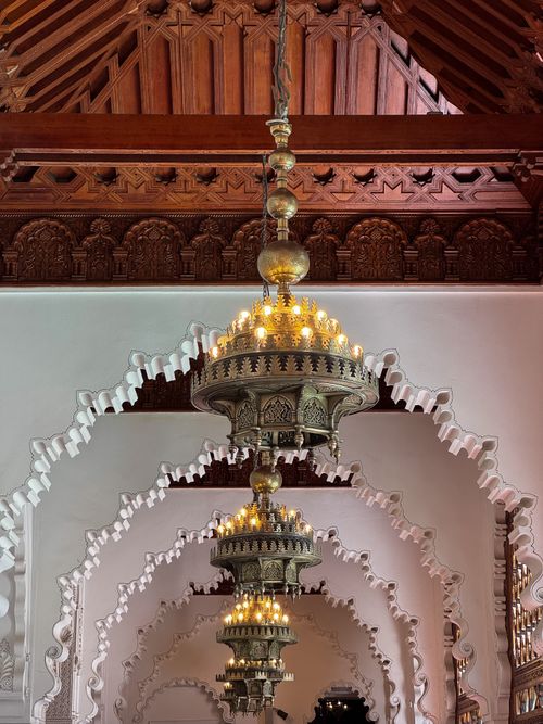 Free Stunning view of elaborate Moroccan chandelier in Rabat with intricate wooden carvings. Stock Photo